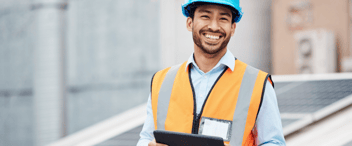 Maintenance-worker-holding-digital-tablet