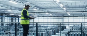 Building-maintenance-worker-using-laptop