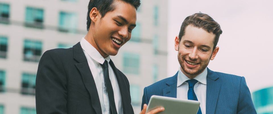 Colleagues-using-digital-tablet