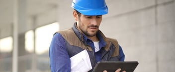 Maintenance-worker-using-digital-tablet