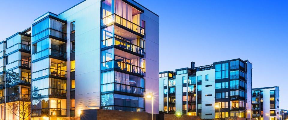 Outdoor-shot-of-glass-building-at-night