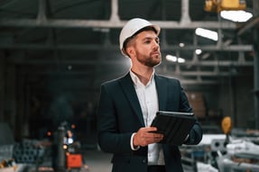 construction-supervisor-holds-tablet-in-industrial-2026-09-24-06-52-52-utc
