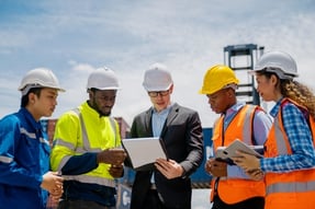 construction-workers-discuss-plans-at-cargo-termin-2026-09-22-13-32-29-utc