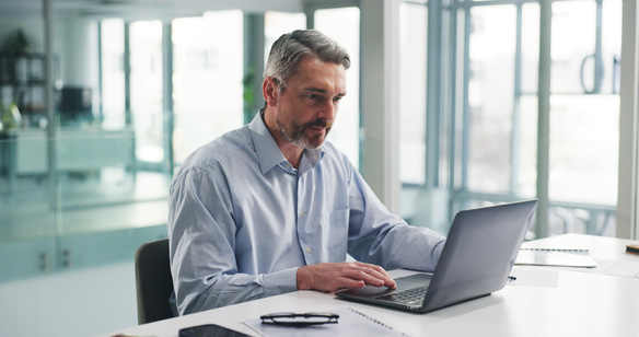 focused-professional-man-working-on-laptop-in-mode-2026-09-25-03-59-11-utc