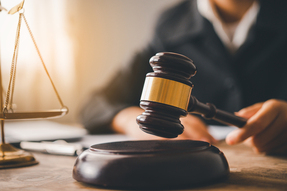 gavel-and-scales-of-justice-in-workplace-setting-2026-09-23-19-14-33-utc