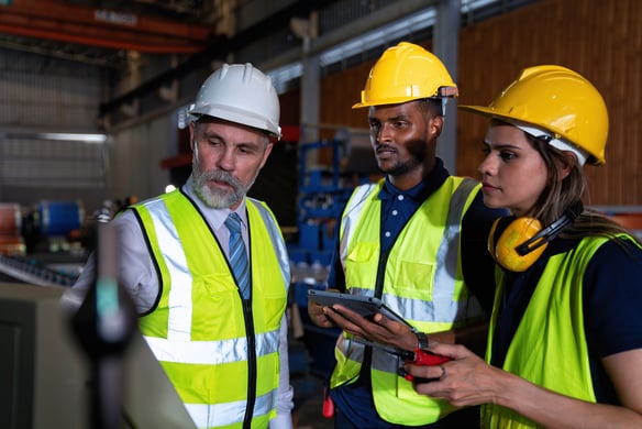 industrial-workers-collaborate-and-analyze-data-on-2026-09-24-04-35-49-utc