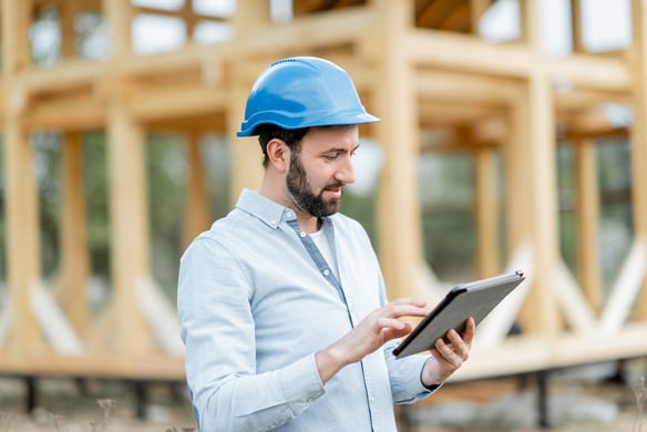 man-with-tablet-at-construction-site-2026-09-23-23-28-22-utc (1)