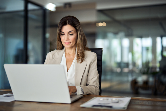 professional-woman-working-on-laptop-in-modern-off-2026-09-21-18-23-13-utc