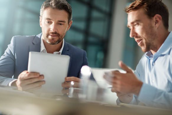 two-men-discussing-business-using-a-tablet-device-2026-09-22-04-26-30-utc