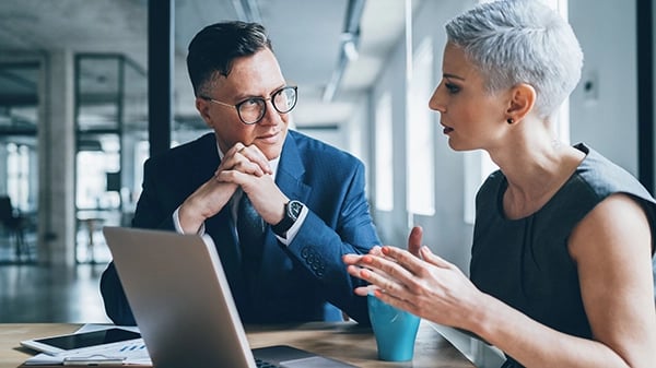 Man Woman Talking Using Laptop