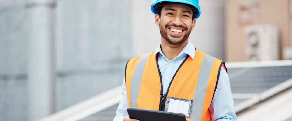 Building-maintenance-worker-holding-digital-tablet