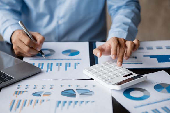 accounting-professional-using-calculator-with-char-2026-09-21-13-00-09-utc