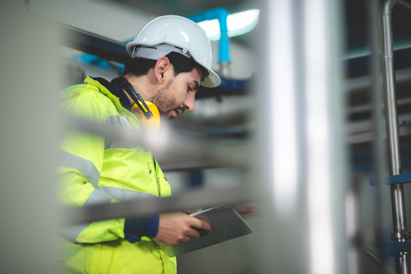 engineer-inspecting-data-on-tablet-in-factory-sett-2026-09-22-03-35-57-utc