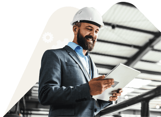 Man With White Hard Hat Holding Tablet
