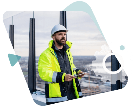 Man In White Hard Hat Using Tablet Man In White Hard Hat Using Tablet