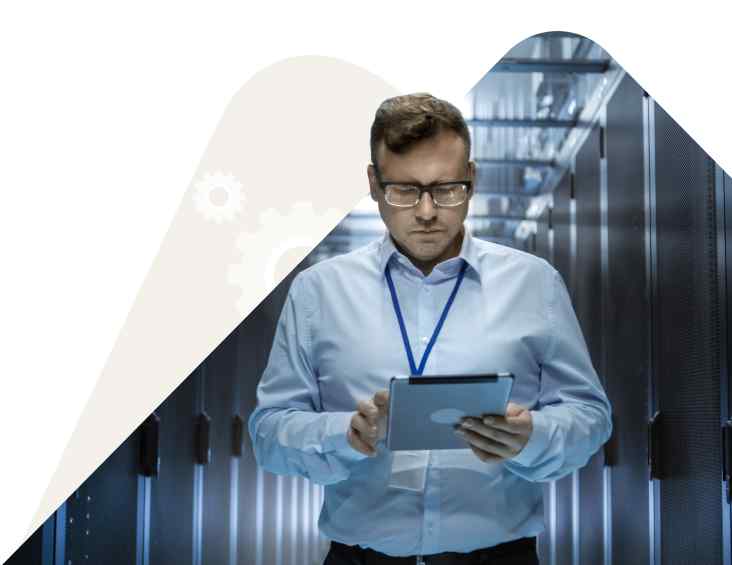 Man In Blue Shirt Using Tablet