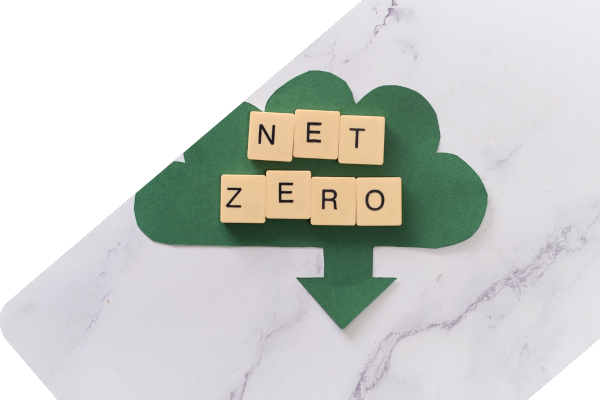 scrabble tiles spelling out net zero