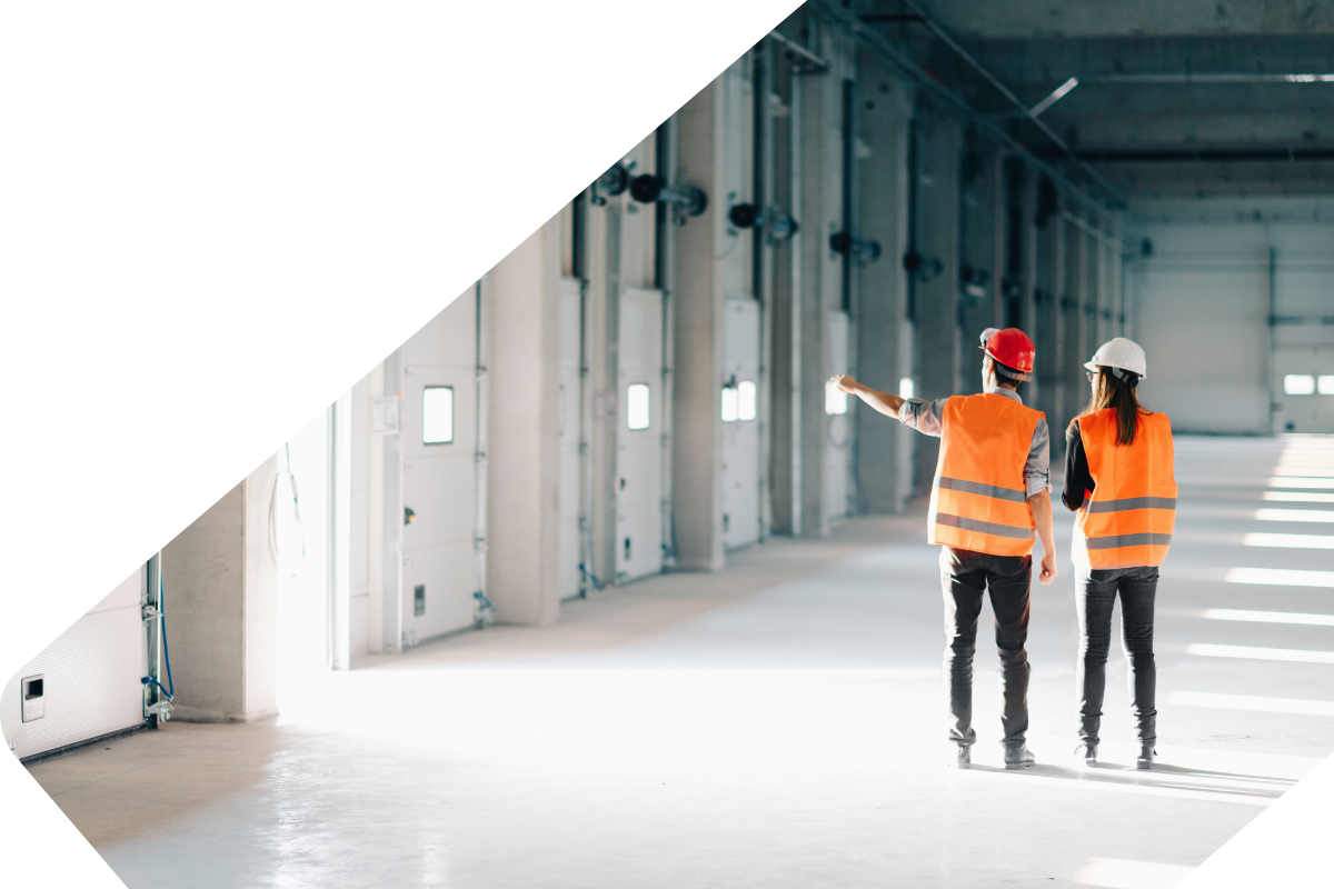 people-in-high-visibility-looking-at-doors